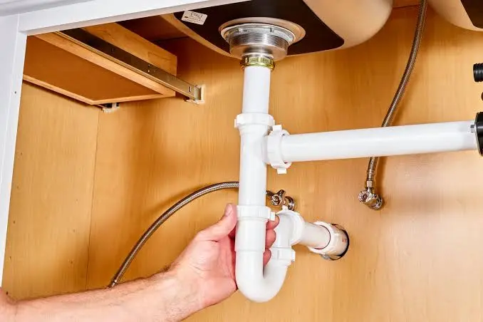 Installing kitchen sink drain Georgetown TX